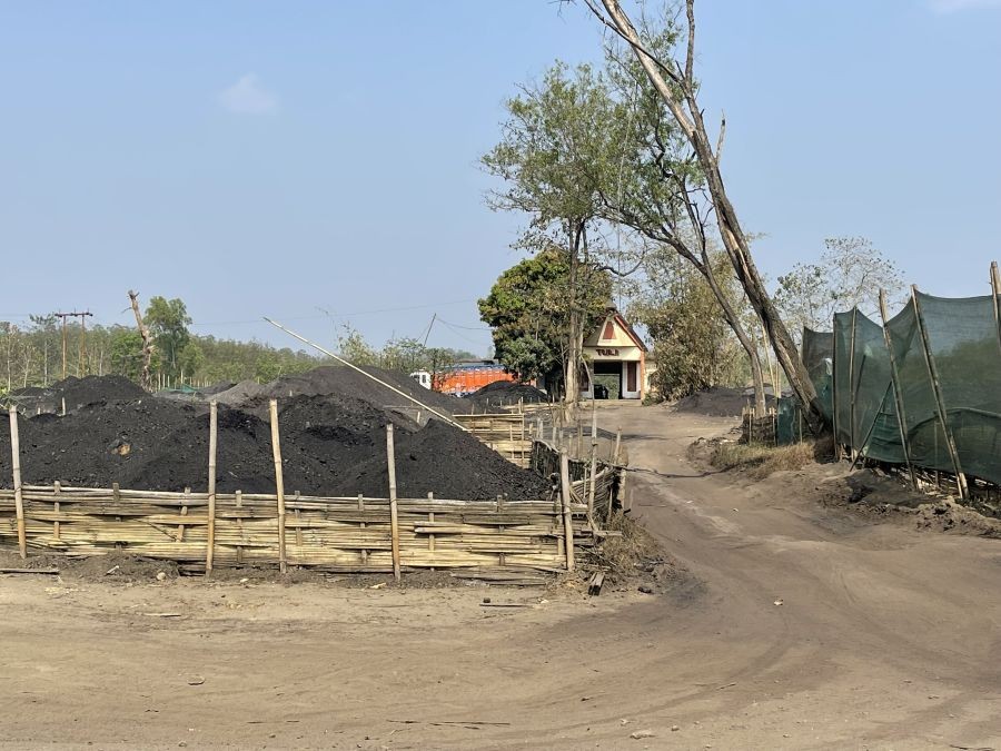 In this file photo taken on March 7, 2023, coal is seen stacked for transportation outside Tuli Railway Station. With passenger train services suspended since 2005, the station is now used solely for handling outward goods traffic, the Nagaland Legislative Assembly was informed on March 4, 2025. (Morung File Photo)